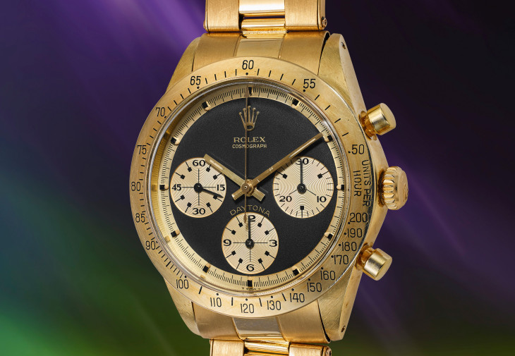 紐約富藝斯鐘錶拍賣品之一,勞力士型號 6239「Paul Newman,John Player Special」黃金計時鏈帶腕錶,備黑色「Paul Newman, John Player Special」錶盤,約 1970 年制。附勞力士修復工作坊保證書、錶盒。估價:500,000 - 1,000,000 美元