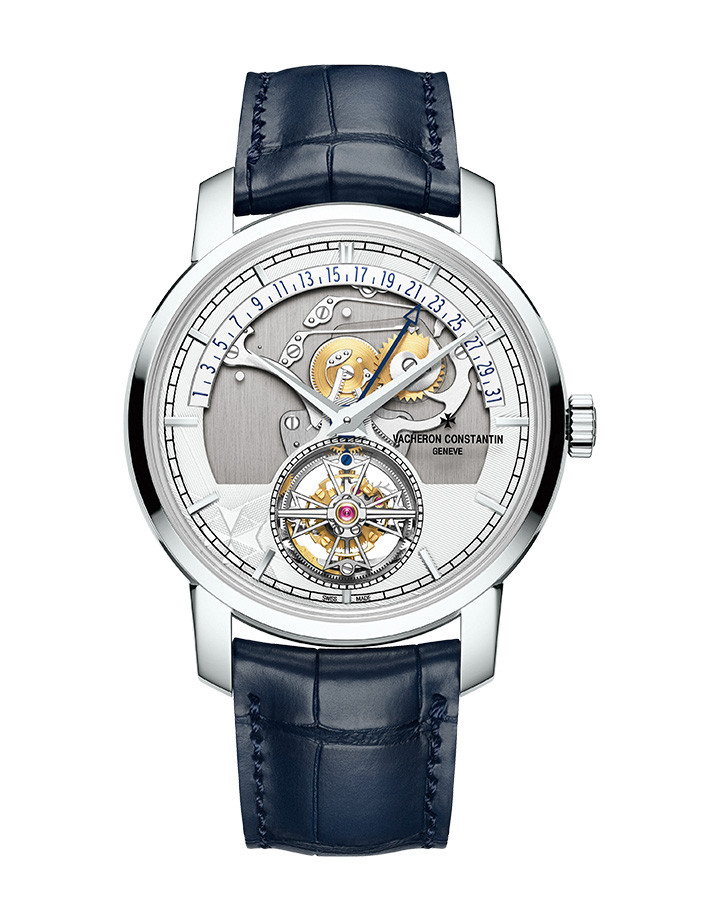 Traditionnelle陀飛輪逆跳日曆鏤雕腕錶